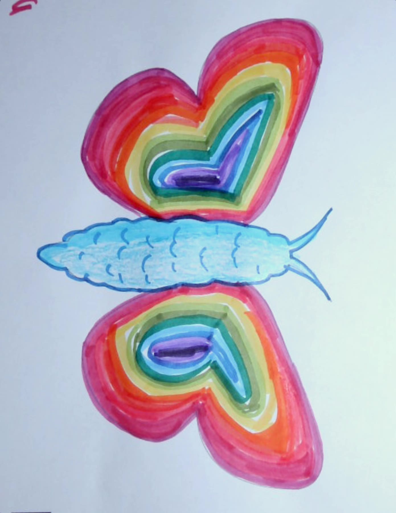 Scanned butterfly coloring page with wings filled in concentric rainbow bands (red, orange, yellow, green, blue, purple) and a light-blue body